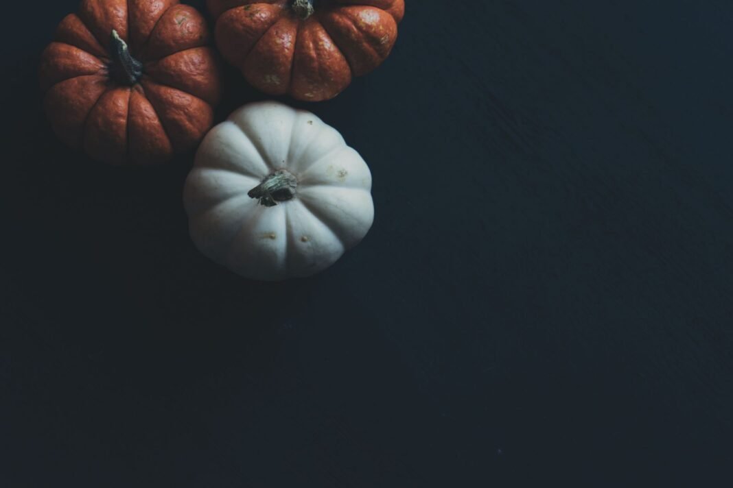 Best Halloween bars in NYC - pumpkins on a dark surface